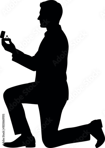 Man on one knee proposing marriage with a ring box in silhouette