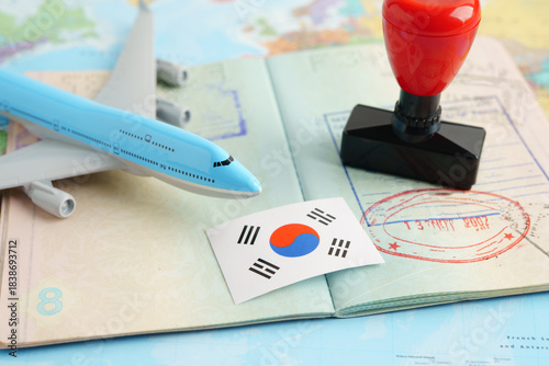 South Korea passport with approved stamp on document for tourism.