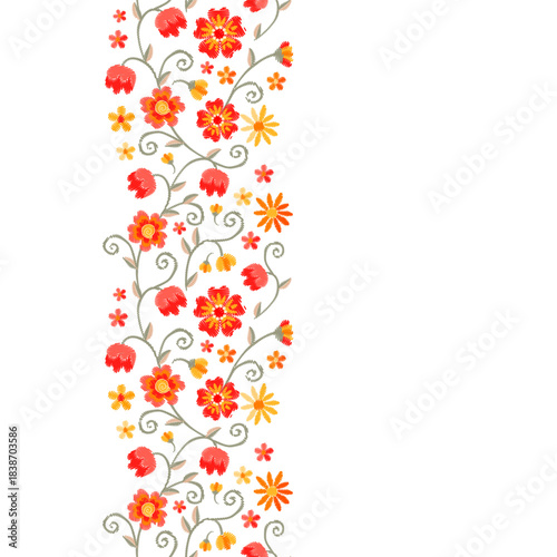 Floral seamless vertical border with pattern from small red and yellow embroidered flowers on white background