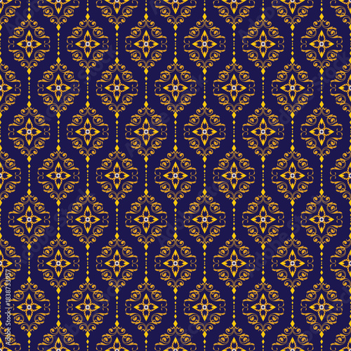 A seamless decorative pattern featuring gold ornamental motifs on a deep navy background, creating a luxurious and elegant look.