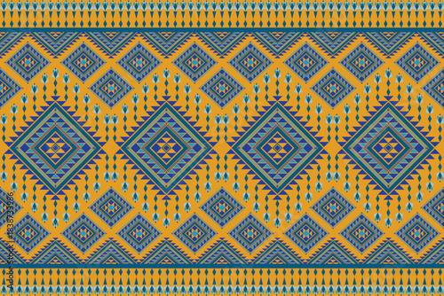 A bright, traditional textile design featuring large, central diamond motifs and repeating geometric shapes in bold yellow, turquoise, and deep blue.