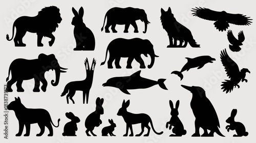 Silhouettes of various animals including lions, elephants, rabbits, birds, and more in black shapes on