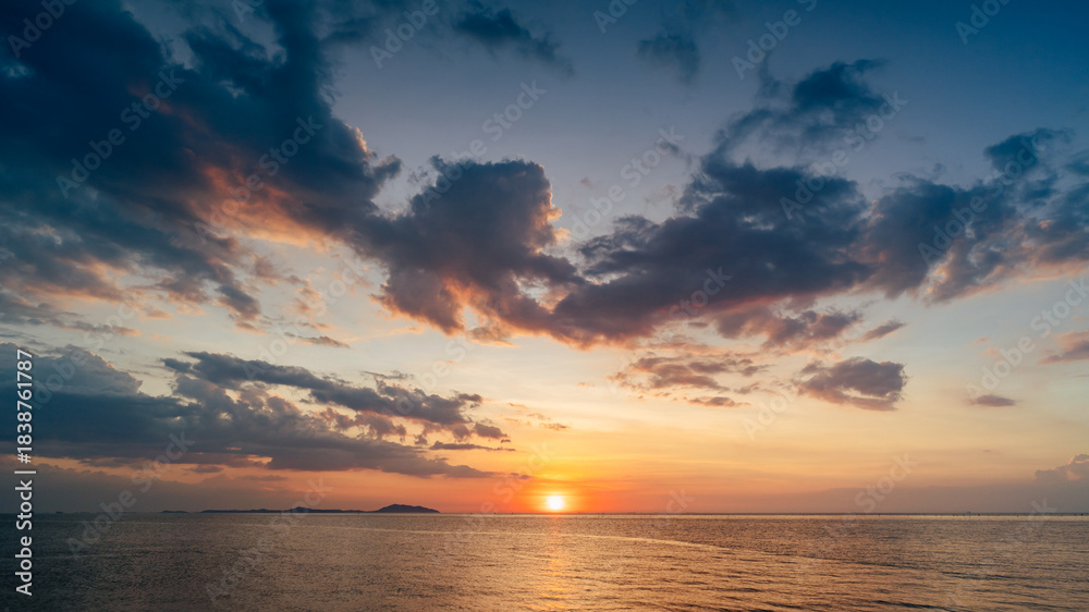 Naklejka premium Aerial of Cloud with sunset sky background in Thailand,Cloudscape time lapse background Dark red purple sunset sky Nature background, sunset in the clouds