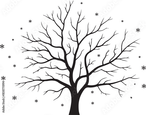 Black silhouette of bare tree with falling snowflakes