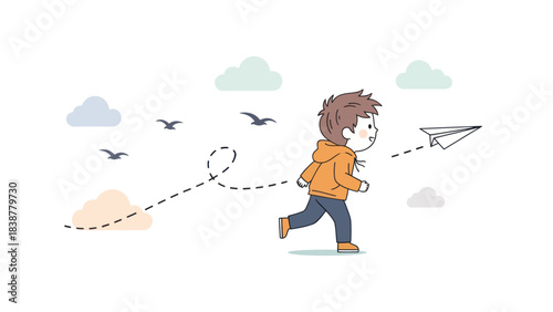 Happy boy launching a paper airplane with joyful imagination