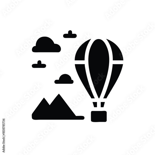 Hot Air Balloon Silhouette Over Mountains