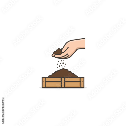 Human hand spreading organic soil onto wooden planter representing plant growth and nurturing life