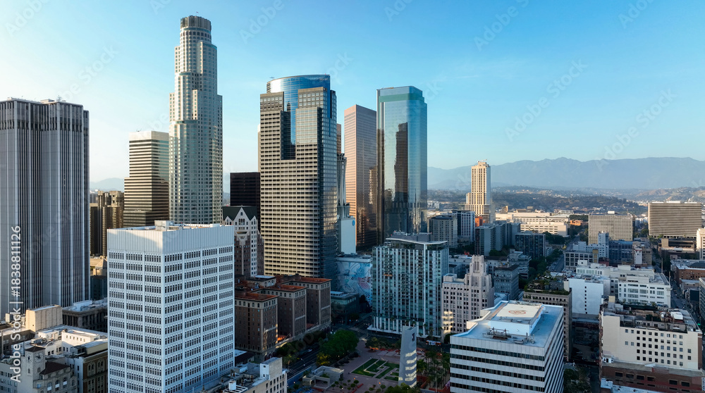Obraz premium Los Angeles district with skyscrapers. Aerial panorama of the LA city. Los Angeles skyline. Modern urban view of Los Angeles with architecture and sky. Los Angeles USA drone photo of downtown skyline.