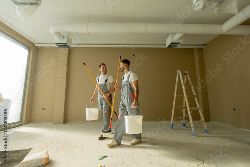 Painters preparing a new wo...