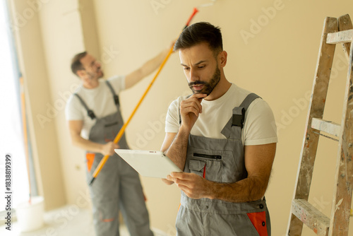Workers collaborating on a ...
