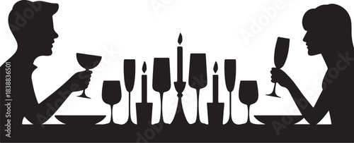 Couple silhouette dining with wine and candles dinner