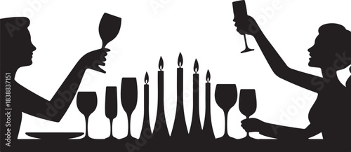 Couple toasting with wine glasses at candlelit dinner