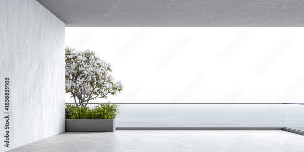 Obraz premium Modern balcony view with white flowers and ocean backdrop in bright daylight