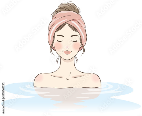 お風呂に入っているへバンドをした女性