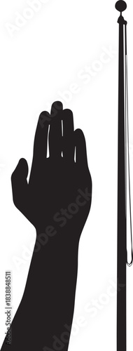 Silhouette of a raised hand next to a flagpole