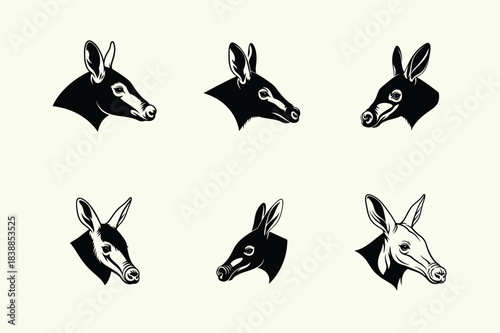 Vintage engraving of donkey heads arranged in a repeating pattern on a white background