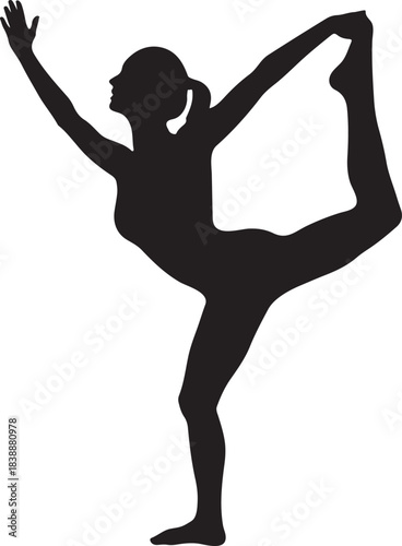 Woman performing yoga dancer pose silhouette