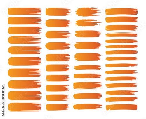Set of orange paint brush strokes and swipes for design elements and artistic effects