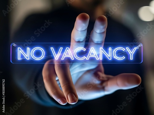 Hand pointing at futuristic holographic 