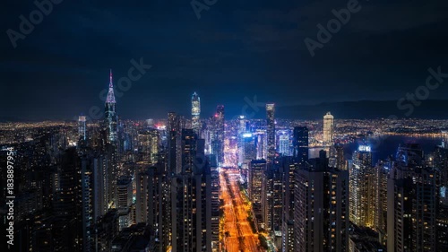 Wallpaper Mural A bustling metropolis at dusk, with tall skyscrapers lining the streets and reflecting the first hints of twilight. Torontodigital.ca