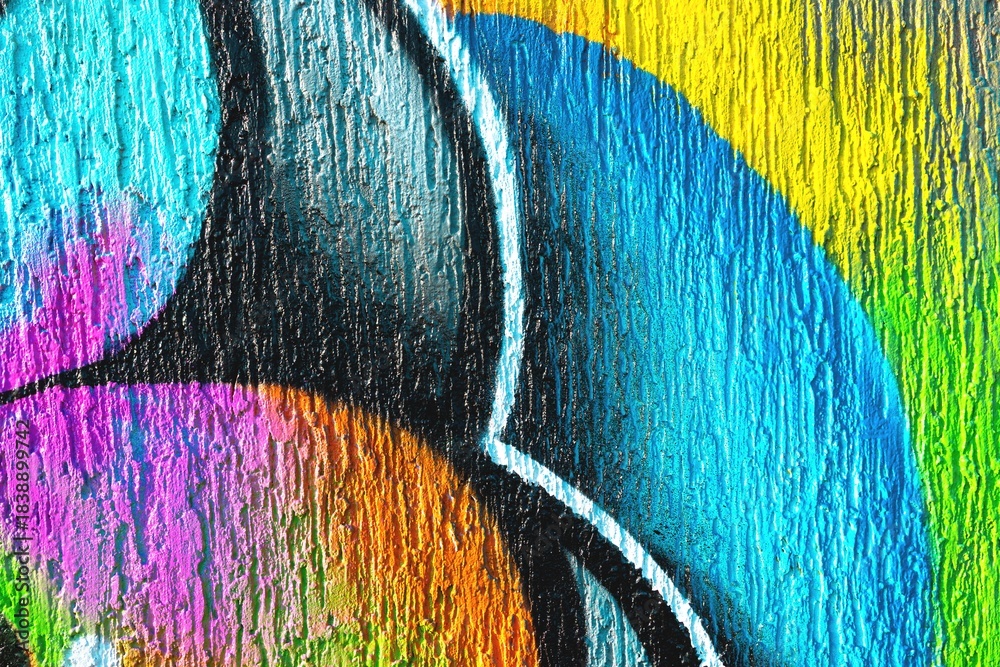 Naklejka premium Graffiti artwork featuring neon blue, pink, yellow, textured surface. 90s, acid style, vibrant colors, dynamic shapes. Street art, urban murals, creative backgrounds, modern 90s visuals.