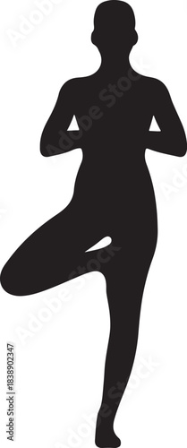 Female silhouette in balancing yoga tree pose for wellness concept