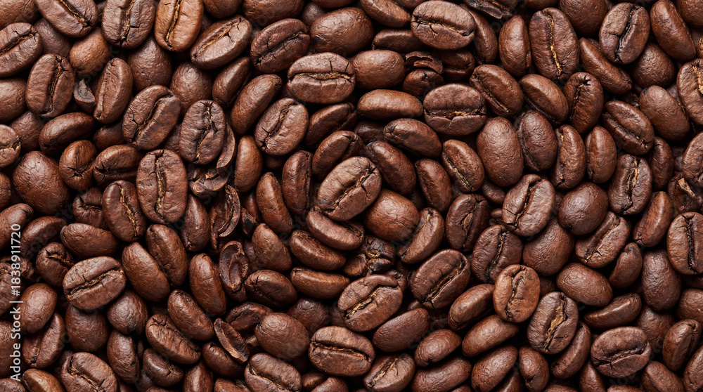 Naklejka premium Top View Texture of Coffee Beans