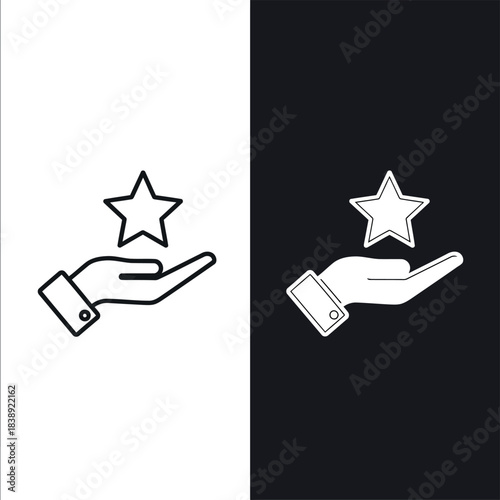 Hand holding a star icon on a split black and white background symbol 