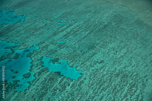 Scenic airplane perspective of Queensland coral reef showing turquoise waters and natural patterns