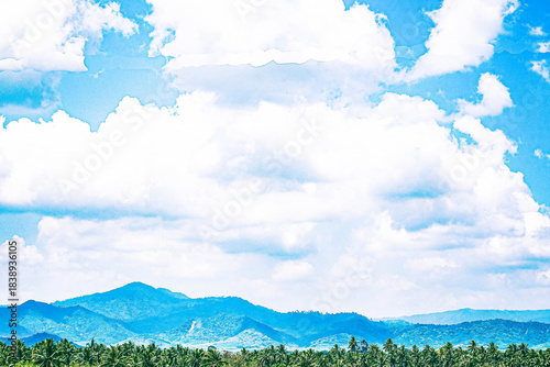 Bright Blue Sky Over Lush Green Mountains