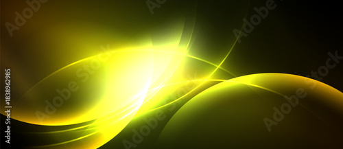 Abstract yellow energy flows, curves, light. Dark background emphasizes bright illumination, creating dynamic visual effect.