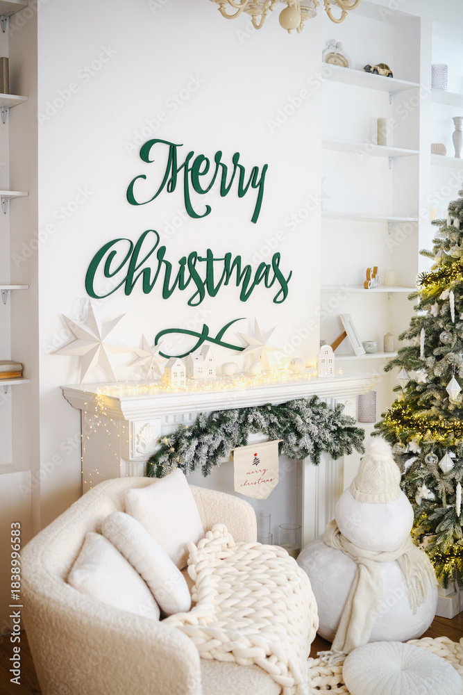 Obraz premium Cozy Christmas scene with decorated fireplace, armchair, and festive tree