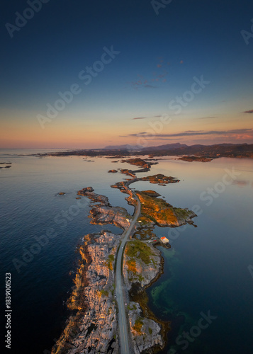 vertical view of the Atlantic Ocean Road near Kristiansund in central Norway at sunset