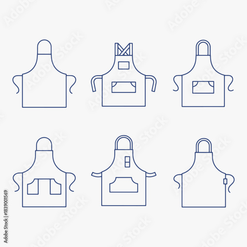 A set of aprons with various designs and pockets. The aprons are arranged in a row.