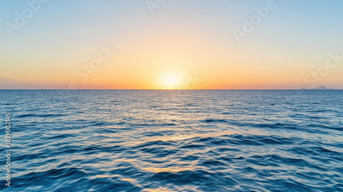Fototapeta Naklejka Na Ścianę i Meble -  Peaceful sea horizon sunset light empty smooth serene ocean