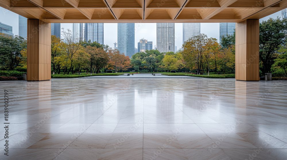 Naklejka premium Open plaza marble floor modern wooden canopy urban park skyline view peaceful autumn