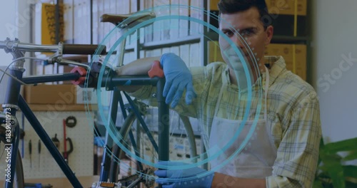 Mechanic adjusting bike stand, camera pulling back and revealing blue overlay showing repairs