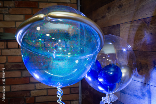 Bright multi-colored inflatable balloons for holiday decoration.