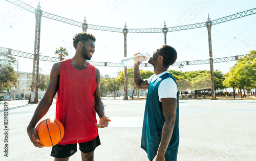 Obraz na plátne Young basketball players training at the court.