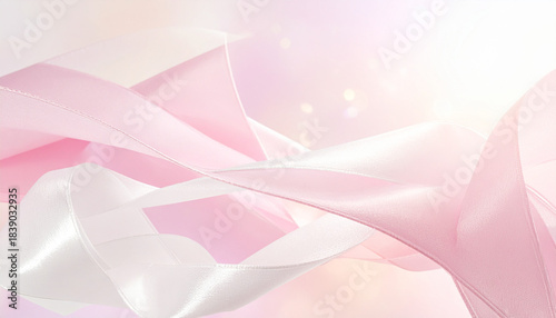 Fototapeta Naklejka Na Ścianę i Meble -  淡いピンクの光沢あるリボンが流れる繊細な抽象背景