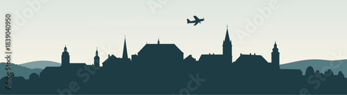 City skyline with airplane on textured background