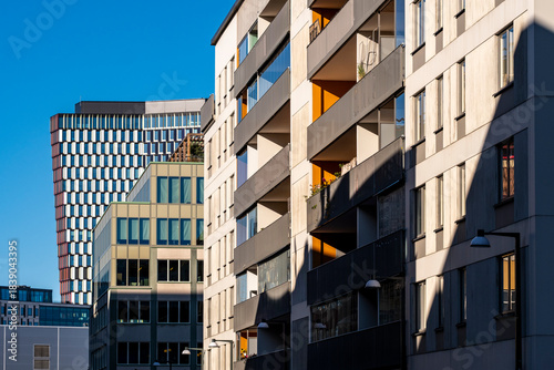 A residential architecture building in modern Stockholm with facade geometry highlighting ongoing development across the evolving cityscape of Hammarbyhamnen
