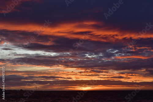 Winter sunrise, Jersey, U.K. Dramatic day breaking over the sea.