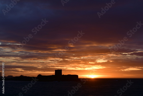 St Aubin fort, Jersey, U.K. Winter sunrise over the island structure.