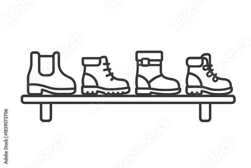 Four distinct boot styles arranged neatly on a display shelf