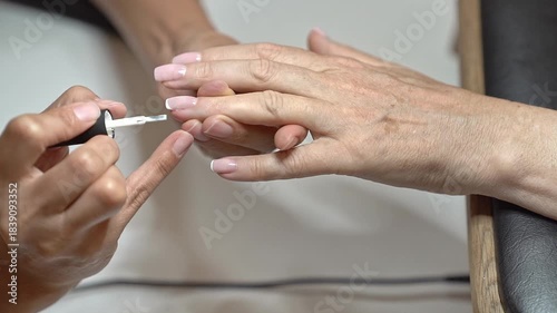 Step by Step Guide to a Classic French Manicure for Mature Hands. Application of the white tip