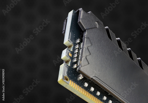 Close-Up Of A Computer RAM Module With Heat Spreader In Dark Background
