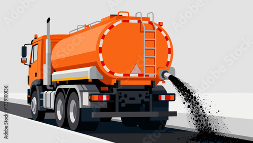Asphalt tanker truck spraying on road surface for construction purposes  