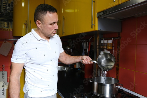 Preparing sugar syrup for soaking cake crust. Professional chef pouring water. High quality 4k footage
