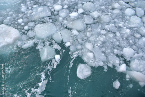 Quadro su tela Aerial view of drift ice and brash ice on the sea